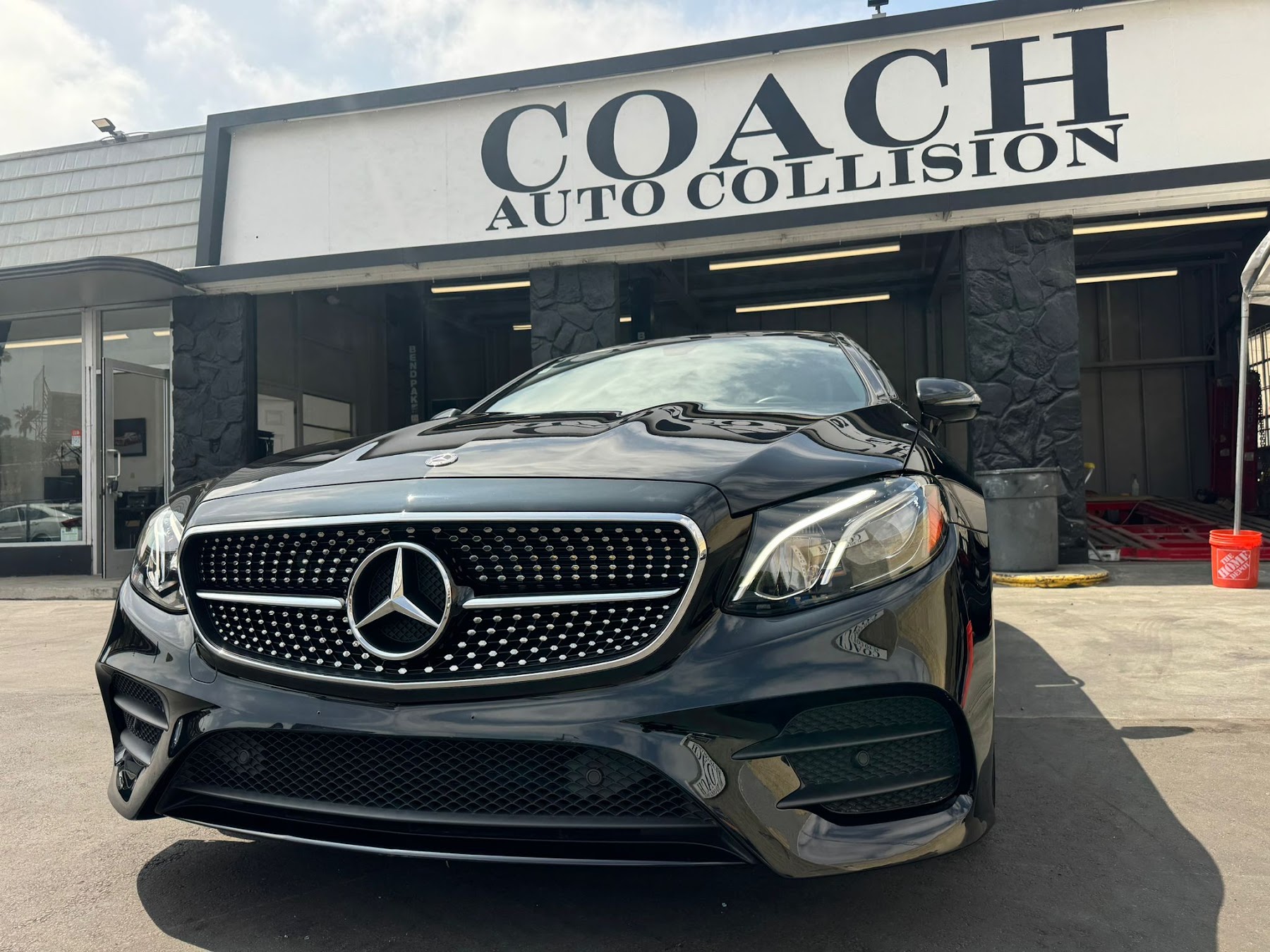 Coach Auto Collision